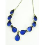 A NORWEGIAN SILVER AND TRANSLUCENT BLUE ENAMEL NECKLACE BY J. TOSTRUP