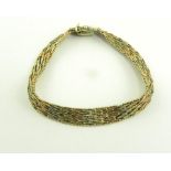 A 9CT THREE COLOUR GOLD BRACELET, 24.2G