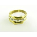 A RUSSIAN/SOVIET TWO COLOUR GOLD RING OF BAMBOO DESIGN, CYRILLIC MAKER'S MARK AND 750, 5G