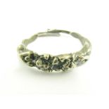 A SILVER CAST FIGURAL MERMAIDS SCARF RING, MARKED 925 STERLING AROUND AN INDISTINCT MAKER'S MARK,