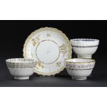 THREE CAUGHLEY TEA BOWLS AND A SAUCER, C1792-95 various patterns and sizes, saucer with gilder's