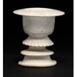 A CHINESE WHITE GLAZED LAMP, SONG DYNASTY the lower part of the flared foot unglazed, 7cm h ++