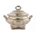 YORK SILVER. A RARE GEORGE IV SOUP TUREEN AND COVER on finely chased paw feet, engraved with