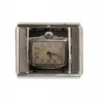 A TAVANNES SILVER TRAVELLING WATCH, C1930 ref 5122, in engine turned case, c1930, 33 x 45mm ++