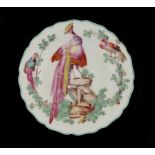 A CHELSEA PLATE, CHELSEA OR DERBY DECORATED, C1765-72 21.5cm diam, anchor in red ++Old rim chip at 2