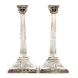 A PAIR OF VICTORIAN SILVER NEO CLASSICAL STYLE COLUMNAR CANDLESTICKS 31.5cm h, by Favell,