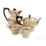 A GEORGE V SILVER TEA SERVICE teapot 13cm h, by The Northern Goldsmith's Co, Birmingham 1931 and a