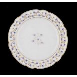 A CAUGHLEY POLYCHROME PLATE, C1792-95 enamelled with cornflowers and gilt, 19.5cm diam, decorator'