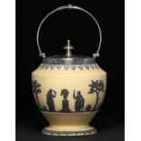 A WEDGWOOD EPNS MOUNTED MUSTARD YELLOW JASPER DIP BISCUIT BARREL AND COVER, C1910 ornamented in