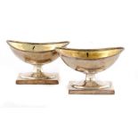 A PAIR OF GEORGE III SILVER SALT CELLARS 6cm h, by Solomon Hougham, London 1802, 4ozs ++Both in fine