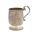 AN UNUSUAL VICTORIAN SILVER CHRISTENING MUG die stamped in high relief with medallions of children