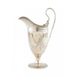 A GEORGE III SILVER BRIGHT CUT AND ENGRAVED HELMET SHAPED CREAM JUG 16cm h, by Robert Hennell,