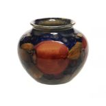 A MOORCROFT POMEGRANATE MINIATURE VASE, C1925 6.5cm h, impressed mark, printed paper label ++In fine