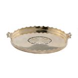 AN EDWARD VII SILVER MINIATURE OVAL TEA TRAY with embossed patera, 17cm w, by R H Halford & Sons,