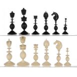 AN INDIAN IVORY CHESS SET, DELHI, C1820-40 stained black and natural, kings 11cm h ++Base of white