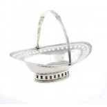 A GEORGE III SILVER BASKET with swing handle, on pierced foot, 13cm h, by Peter and Ann Bateman,