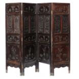 A CHINESE CARVED WOOD FOUR FOLD SCREEN, LATE 19TH C of probably, Hongmu, carved to both sides with