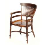 AN ARTS & CRAFTS OAK ARMCHAIR, THE DESIGN ATTRIBUTED TO E W GODWIN, C1881 87cm h The furniture maker