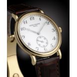 A PATEK PHILIPPE 18CT GOLD GENTLEMAN'S WRISTWATCH, CALATRAVA SERIAL NO 5022J0013 calibre 215