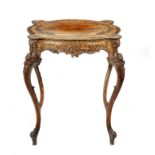 AN ITALIAN CARVED WALNUT TABLE, 19TH C the apron with a drawer, 75cm h; 56 x 66cm ++Minor wear and