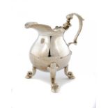 A GEORGE II SILVER CREAM JUG 9cm h, by William Shaw, London 1737, 5ozs ++A well made jug of good