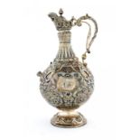 A VICTORIAN SILVER CLARET JUG OF 'ARMADA' PATTERN 31cm h, by Mappin Bros, London 1900, 28ozs ++In