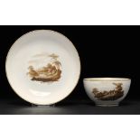A PINXTON TEA BOWL AND SAUCER, 1796-1813 painted with landscapes, saucer 13.5cm diam ++The tea