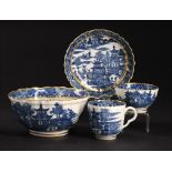 A CAUGHLEY BLUE AND WHITE ROYAL FLUTE SLOP BASIN AND MATCHING CAUGHLEY TRIO, C1779-88 printed with