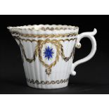 A CAUGHLEY POLYCHROME REEDED CREAM JUG, C1788-93 enamelled with the Star and Husks Swag pattern, 7.