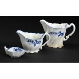 TWO CAUGHLEY BLUE AND WHITE HIGH AND LOW CHELSEA EWERS AND A MATCHING BUTTER BOAT, C1779-88