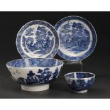 A CALCUT BLUE AND WHITE FLUTED SAUCER AND A MATCHING PEARLWARE TEA BOWL AND SAUCER AND SLOP BASIN,