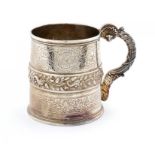 A GEORGE IV SILVER CHRISTENING MUG chased and engraved with oak leaves and vines respectively, 9cm