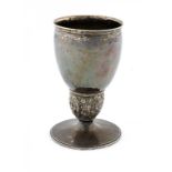 AN ARTS & CRAFTS SILVER WINE CUP BY OMAR RAMSDEN AND ALWYN CARR 11cm h, maker's mark, London 1912,