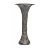 A CHINESE BRONZE ARCHAIC STYLE BEAKER, GU, 19TH/20TH C 30cm h Provenance: Acquired in South East