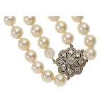 A CULTURED PEARL TWO STRAND NECKLACE of approx 9mm cultured pearls with white gold and diamond