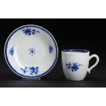 A CAUGHLEY BLUE AND WHITE COFFEE CUP AND SAUCER, C1790 painted with the Salopian Sprigs pattern,