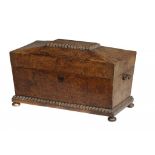 A WILLIAM IV BURR YEW WOOD TEA CADDY, C1830 the fitted interior with pair of canisters, 33cm w and a