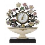 A FRENCH GILTMETAL AND PORCELAIN CLOCK, EARLY 20TH C the drum cased timepiece with enamel dial set