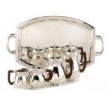 A FRENCH ART DECO SILVER FIVE PIECE TEA AND COFFEE SERVICE, C1930 tray 661cm w, by Boulenger,