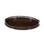 A VICTORIAN MAHOGANY OVAL TEA TRAY, LATE 19TH C with fretwork gallery, 58.5cm w ++In good condition,