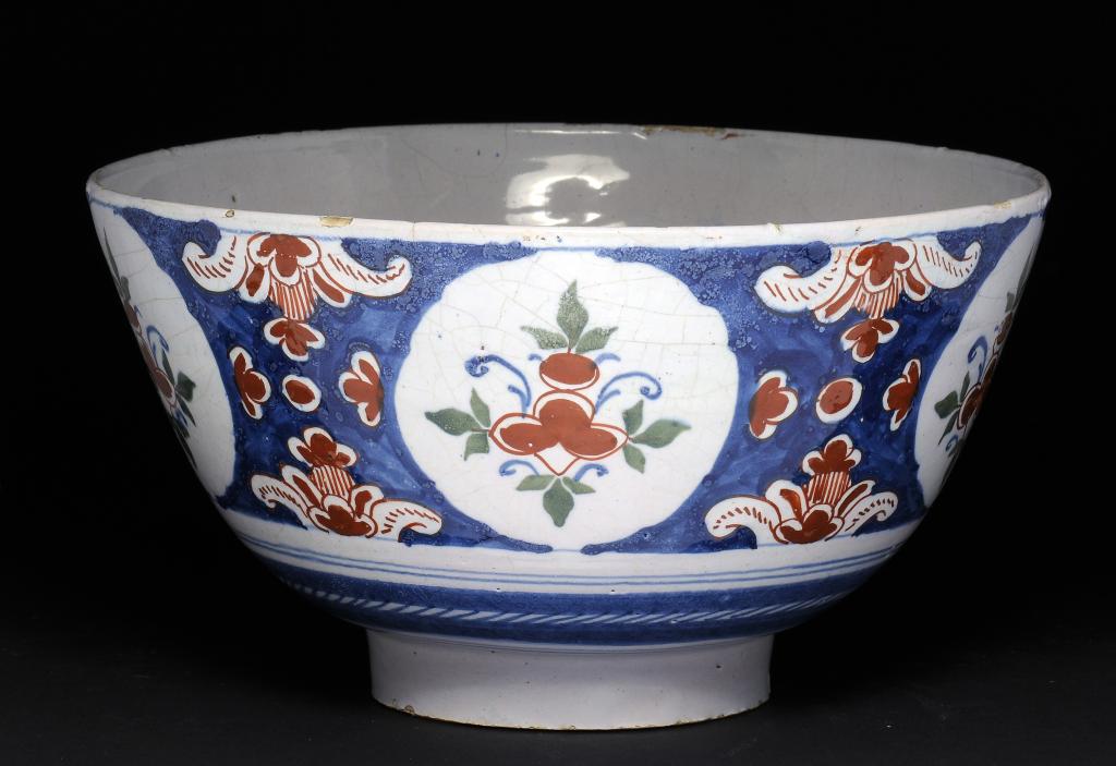 AN ENGLISH DELFTWARE BOWL, BRISTOL, C1750 painted in the blue, red, green palette, the interior with