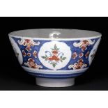 AN ENGLISH DELFTWARE BOWL, BRISTOL, C1750 painted in the blue, red, green palette, the interior with