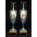 A PAIR OF FRENCH ORMOLU MOUNTED SÈVRES STYLE BLEU CELESTE GROUND SLENDER OVIFORM VASES, LATE 19TH