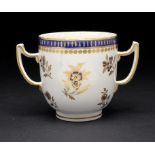 A CAUGHLEY BLUE AND GILT CHOCOLATE CUP, C1788-93 in the Dresden Flowers pattern, 9.5cm h ++Wear to