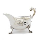 A GEORGE II SILVER SAUCE BOAT crested, 22cm l, by Edward Jay, London 1757, 12ozs ++A well made large