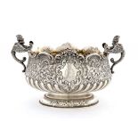 A SCOTTISH VICTORIAN SILVER BOWL with winged figure handles, engraved with armorials, 28cm w, by