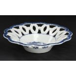 A CAUGHLEY BLUE AND WHITE RETICULATED DISH, C1779-88 printed with the Fisherman pattern, 18cm diam