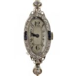 A SWISS SAPPHIRE, DIAMOND AND PLATINUM COCKTAIL WATCH, NERNY WATCH CO, C1930 the oval case 25 x 15mm