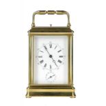 A FRENCH BRASS CARRIAGE CLOCK, C1900 with alarm and striking on a gong, in gorge case with repeat