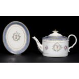A COALPORT CRESTED OVAL TEAPOT, COVER AND STAND, C1805-10 with lavender blue diaper spearhead
